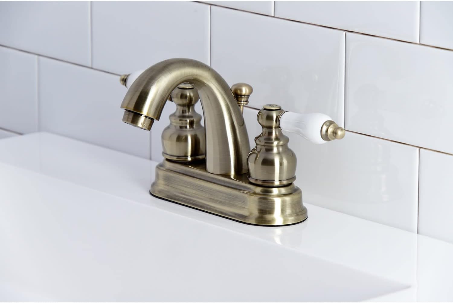 Kingston Brass KB5617PL Restoration 4-Inch Centerset Bathroom Faucet, Brushed Brass