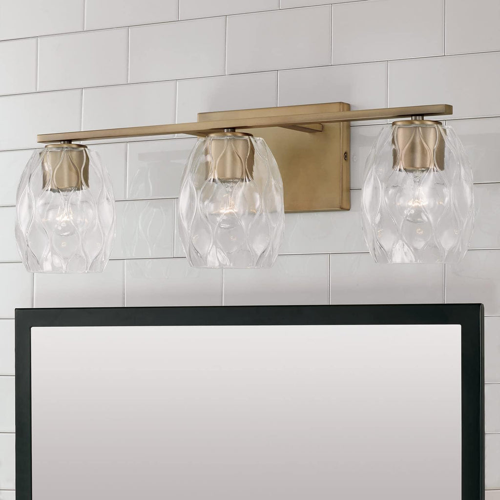 Capital Lighting 145331AD-525 Lucas Transitional Wavy Embossed Glass Vanity Lights for Bathroom, 3-Light 300 Total Watts, 8' H x 24' W, Aged Brass