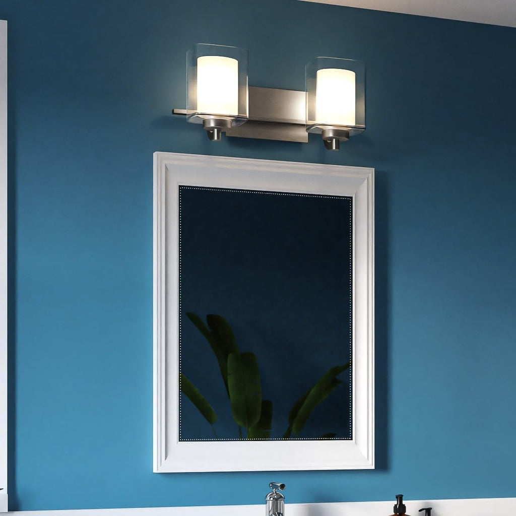 Quoizel Kolt Modern Vanity Lights, 2-Light, 18 Inch Brushed Nickel Bathroom Lighting Fixtures Over Mirror, Sandblasted Inner Glass, 100 W A19 Bulb, Wall Mount Light for Bathrooms, Kitchen or Hallway