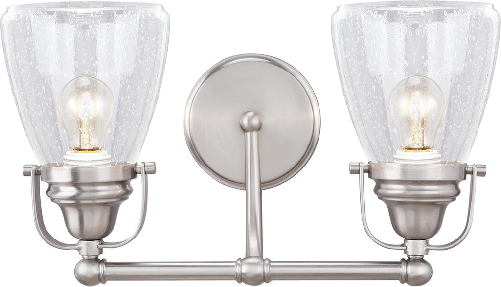 Aspen Creative 62098, Two-Light Metal Bathroom Vanity Wall Light Fixture, 15 3/4' Wide, Transitional Design in Brushed Nickel with Clear Seedy Glass Shade