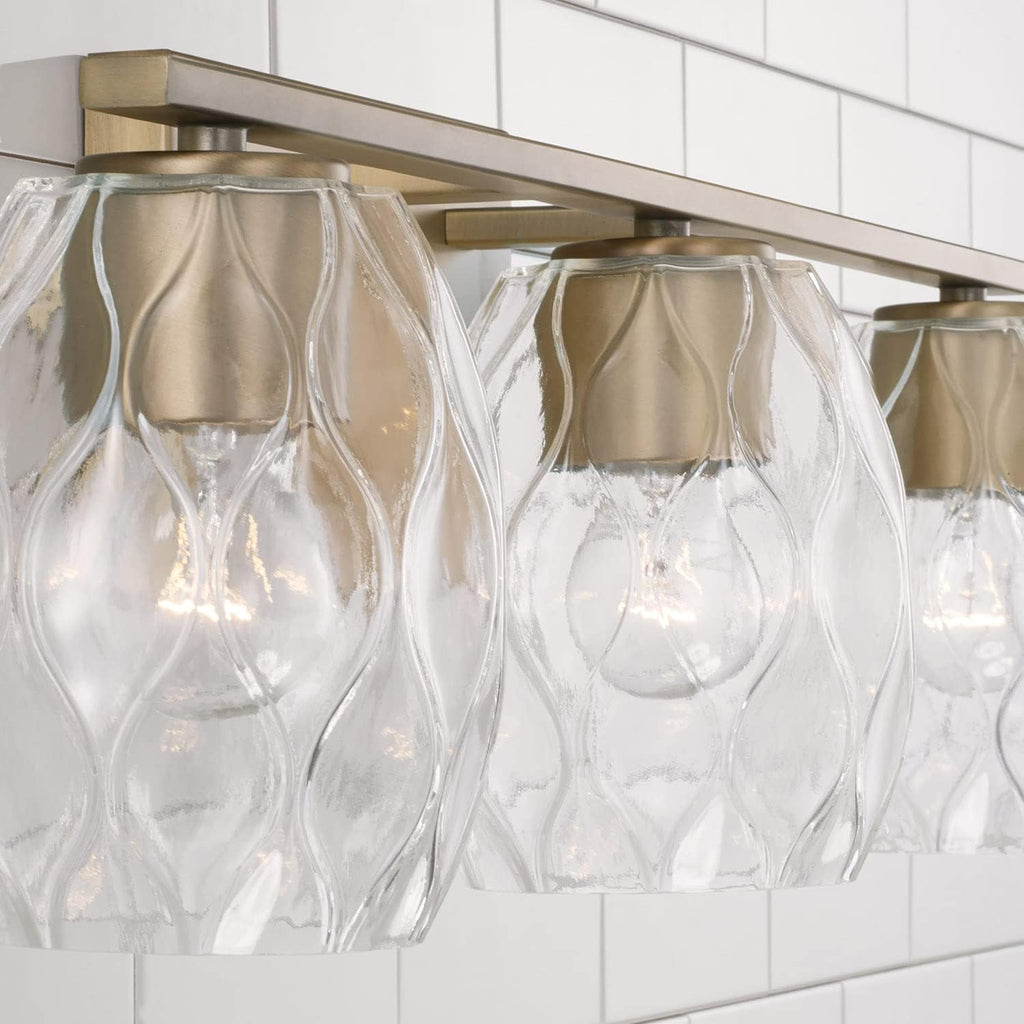 Capital Lighting 145331AD-525 Lucas Transitional Wavy Embossed Glass Vanity Lights for Bathroom, 3-Light 300 Total Watts, 8' H x 24' W, Aged Brass