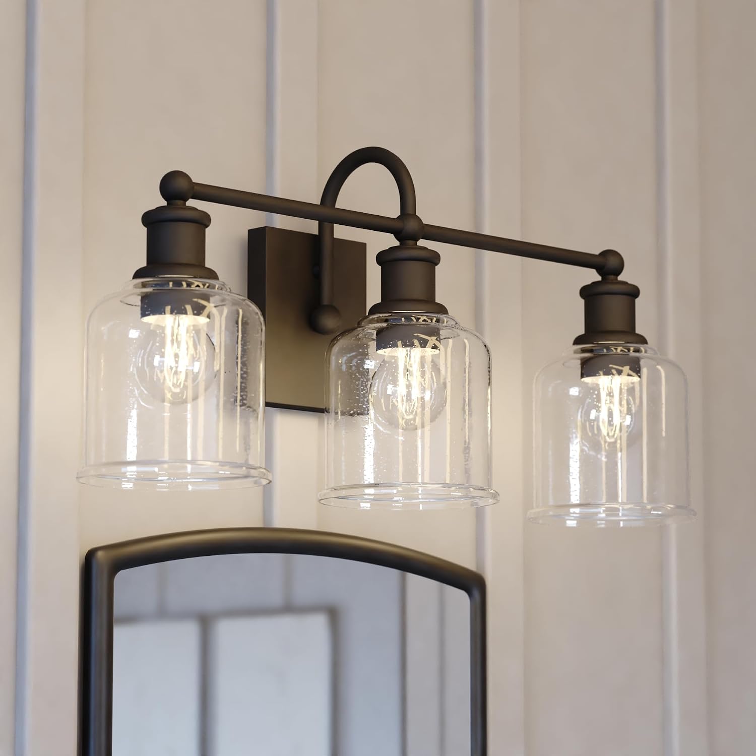 VAXCEL Northbrook 3-Light 24 in. Wide Matte Black Traditional Bathroom Vanity Lighting Fixture, Clear Seeded Glass Shade, Dimmable, LED Compatible, Over The Mirror Mounted Steel Wall Sconce