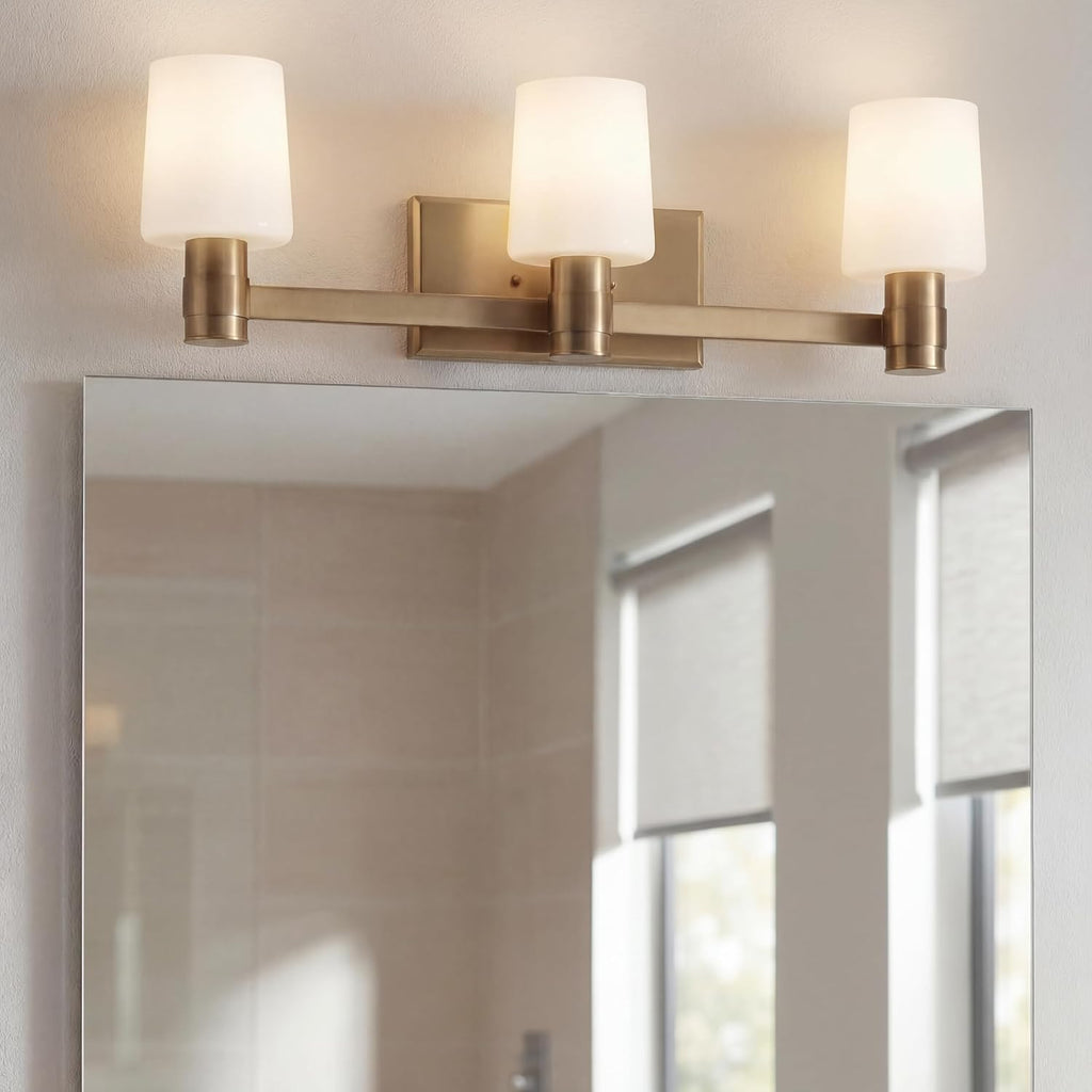 Kichler Adani 3-Light Vanity Light Fixture, Modern Bathroom Vanity Lighting with Opal Glass in Champagne Bronze for Bathroom or Powder Room Wall Mount (8.25' x 24'), 55176CPZ